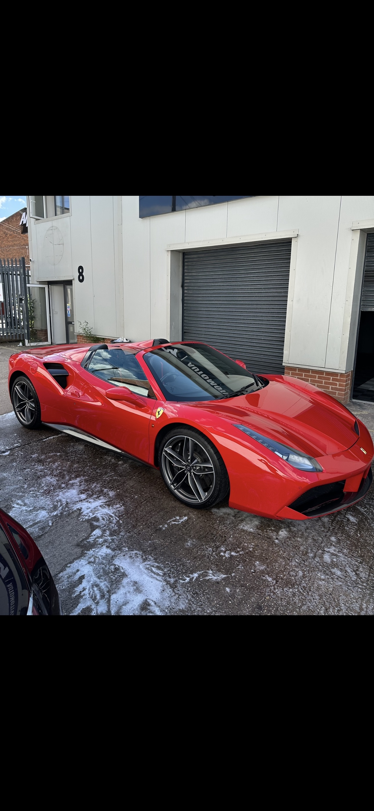Red Ferrari with ceramic coating