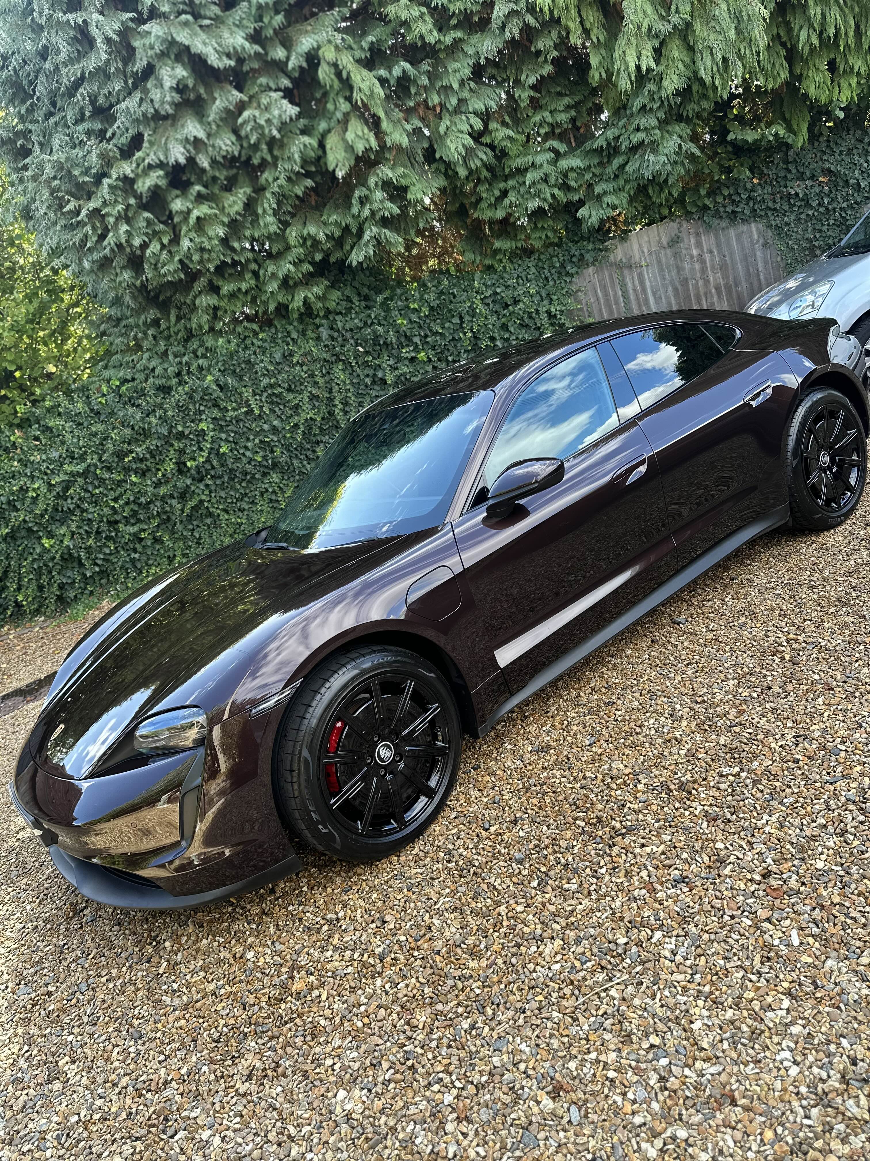Black Porsche showing glossy ceramic coating finish